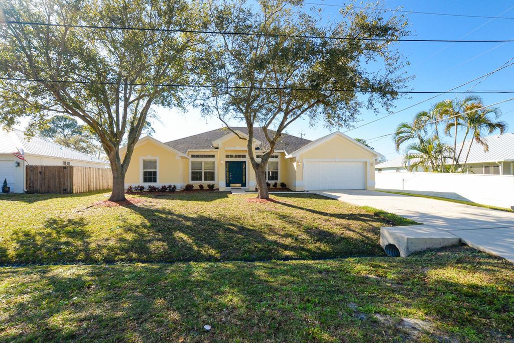Photo of 1688 SW Bascom Avenue, Port Saint Lucie, FL 34953 (MLS # R11057930)