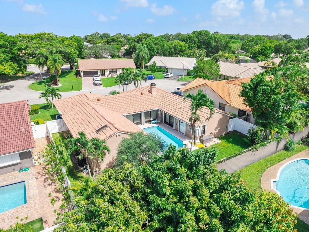 Photo of 5064 NW 66th Lane, Coral Springs, FL 33067 (MLS # F10514071)