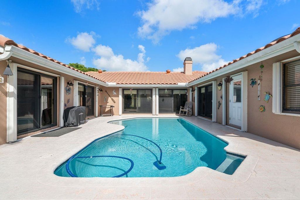 Photo of 5064 NW 66th Lane, Coral Springs, FL 33067 (MLS # F10514071)