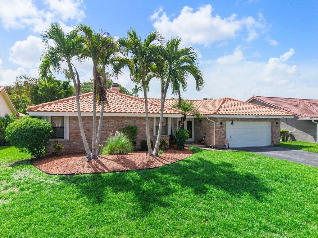 Photo of 5064 NW 66th Lane, Coral Springs, FL 33067 (MLS # F10514071)