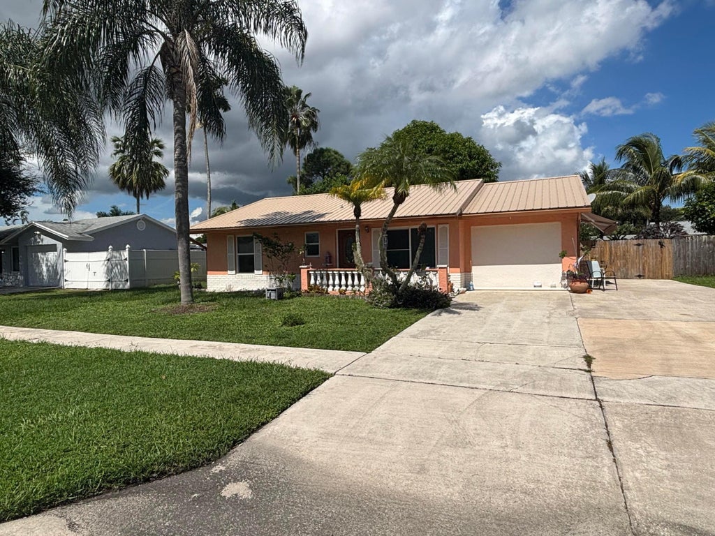 Photo of 4553 VESPASIAN Court, Lake Worth, FL 33463 (MLS # B26086902)