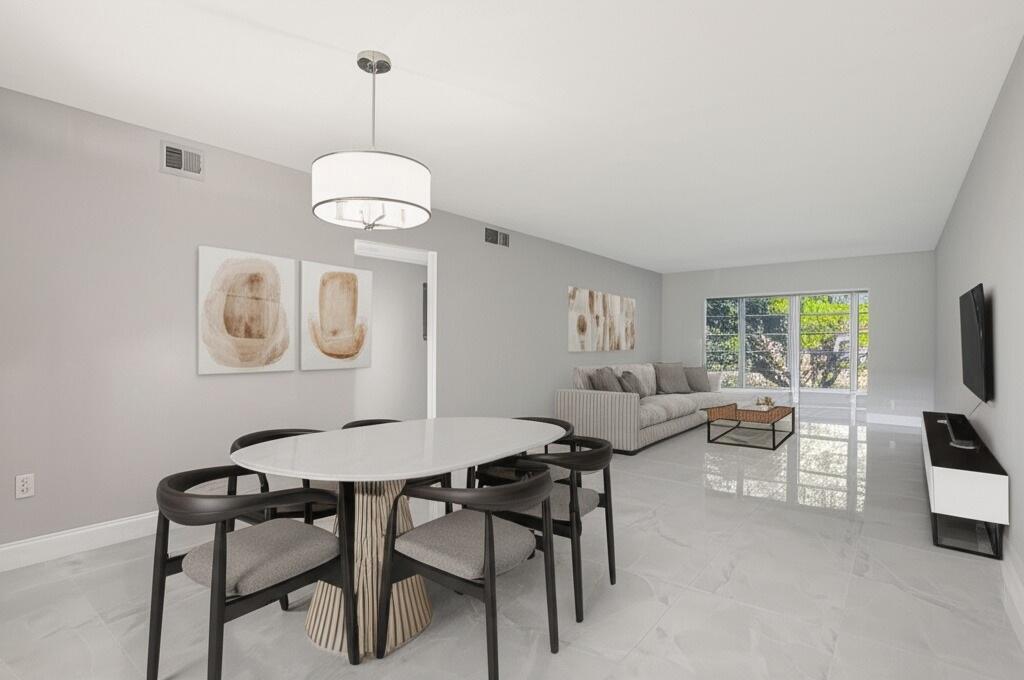 FULLY RENOVATED 2-Bedroom Condo in the Heart of Wynmoor! This beautifully UPDATED 2-bed, 2-bath condo is located in the desirable Lucaya Village within the 55+ Wynmoor community. This spacious 2nd-floor unit features an open floor plan with plenty of natural light, LAKE VIEWS, an updated kitchen with modern appliances & ample cabinet space. Primary suite with a walk-in closet & en-suite bath. The unit is tiled throughout, offering easy maintenance & a fresh, clean look. Wynmoor is renowned for its resort-style amenities, including a championship golf course, fitness center, tennis courts, pools, theater, restaurant, numerous clubs & social activities. 24-hour gated security with access to shopping, dining, & major highways, this is South Florida active adult living at its best.