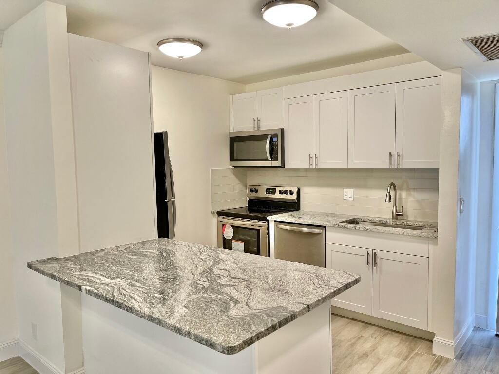Photo of 725 Hummingbird Way #214, North Palm Beach, FL 33408 (MLS # R10873308)