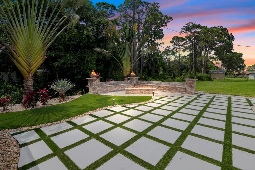 Photo of 1692 SE Floresta Drive, Port St Lucie, FL 34983 (MLS # R10892363)