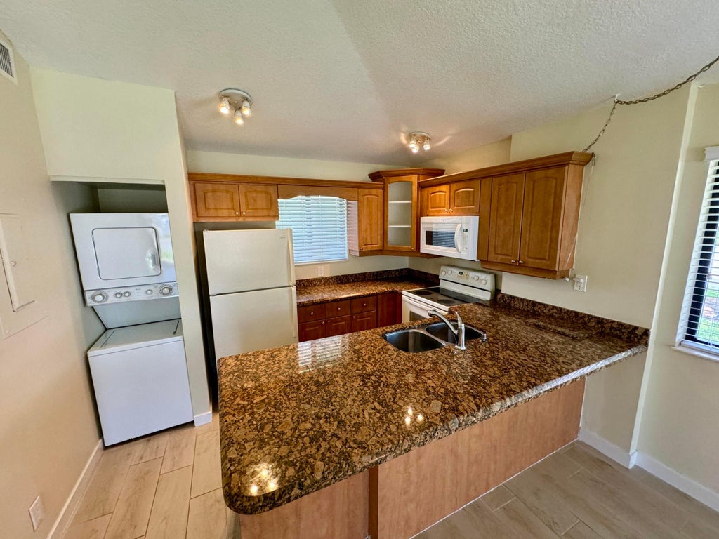 Photo of 705 Club Drive, Palm Beach Gardens, FL 33418 (MLS # R10990672)