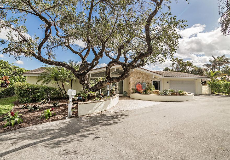 Located in the Uber desirable South of Southern (SOSO) neighborhood and situated on an oversized 32,000+ sq ft lot directly on the Intracoastal waterway rests this 4,064 square foot one story ranch-style home with 4 bedrooms and 3.5 bathrooms. Boasting Riparian rights and a deep water dock, this property has views of the island of Palm Beach from practically every window. When approaching the home, one drives through the long winding driveway which immediately brings to your attention the enormity of the property. Once in the foyer, your eyes will immediately catch the glistening colors of the sun dancing on the water outside both in the swimming pool as well as the Intracoastal waterway. 

The home is NOT historic and the property is not located in a historic neighborhood. Renovate the current structure or tear it down and create your vision of the perfect waterfront home. Close to area beaches, PBI airport, downtown WPB, Worth Ave and in the South Olive Elementary School District.