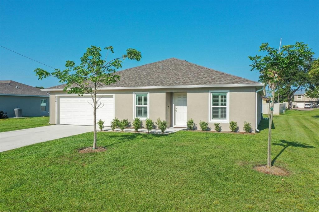 Photo of 2341 SE Midtown Road, Port St Lucie, FL 34952 (MLS # R10888744)
