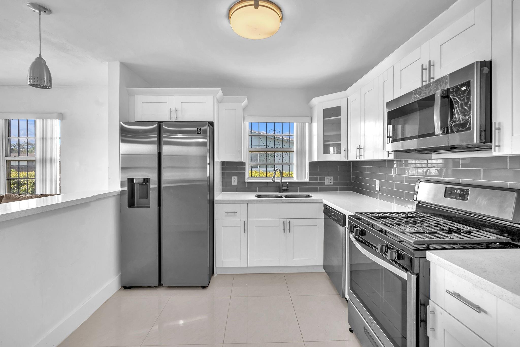This spectacular single-family home offers 3 bedrooms and 2 bathrooms, fully updated with modern finishes. The spacious kitchen features granite countertops and updated cabinetry, while the open living areas are accented with sleek 24x24 tile flooring throughout. Enjoy peace of mind with a newer A/C and recently completed renovations that make this home truly move-in ready. Conveniently located near major highways and shopping centers, the home is just minutes from Hard Rock Stadium, Miami, Hollywood, and Fort Lauderdale. You’ll have quick access to airports, beaches, seaports, and vibrant downtown areas while still enjoying the comfort of a quiet residential neighborhood.
This is the perfect rental for anyone seeking style, comfort, and convenience all in one!