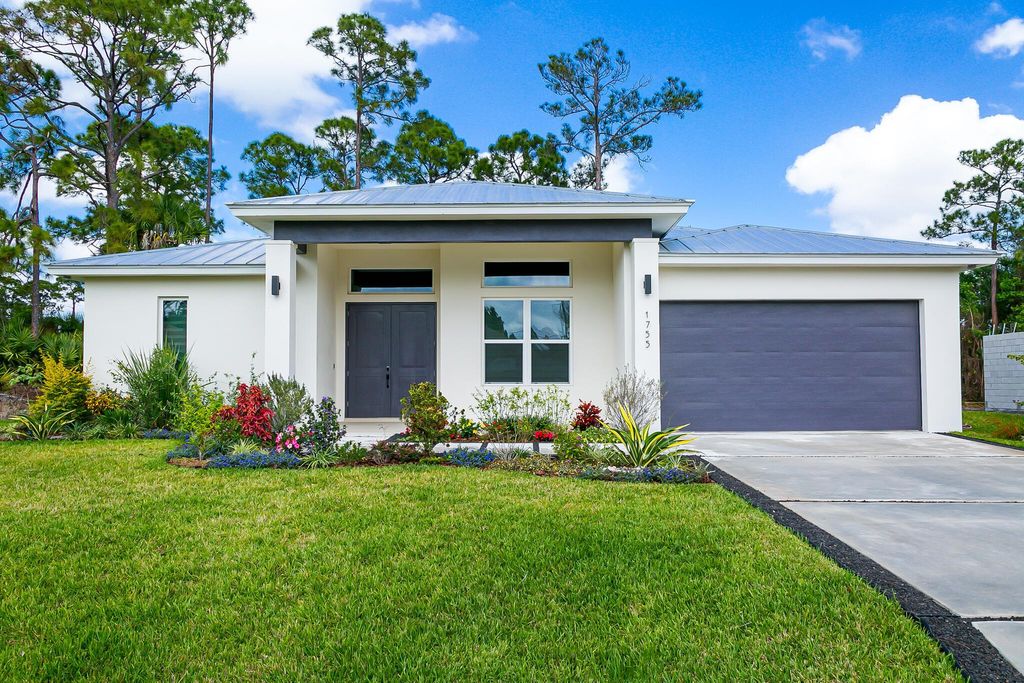 Photo of 1755 SW Bellevue Avenue, Port Saint Lucie, FL 34953 (MLS # R11094535)
