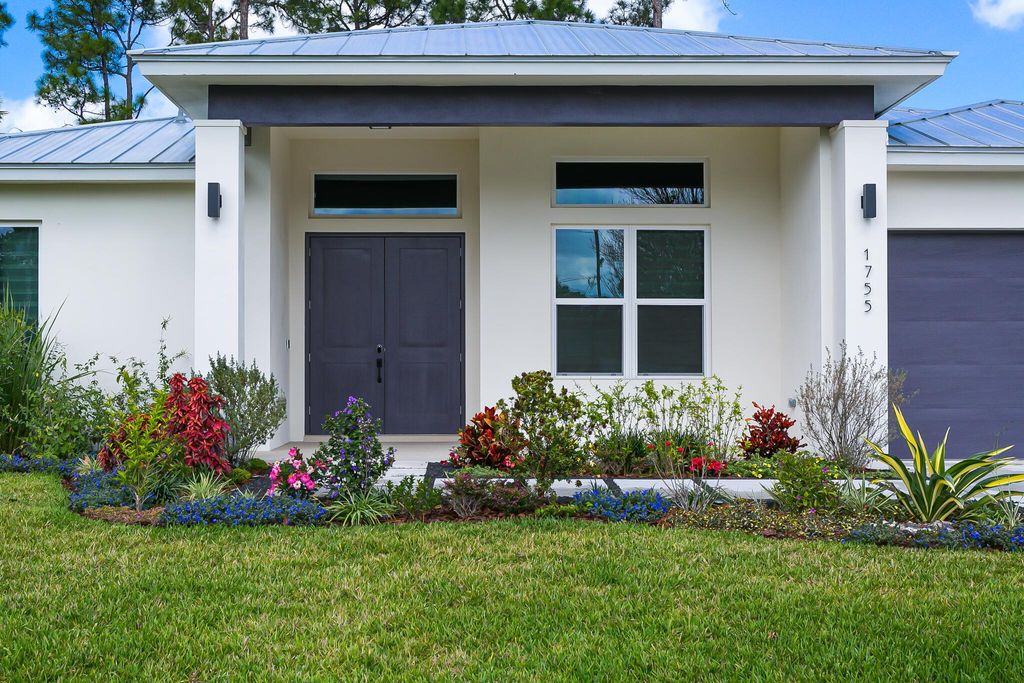 Photo of 1755 SW Bellevue Avenue, Port Saint Lucie, FL 34953 (MLS # R11094535)