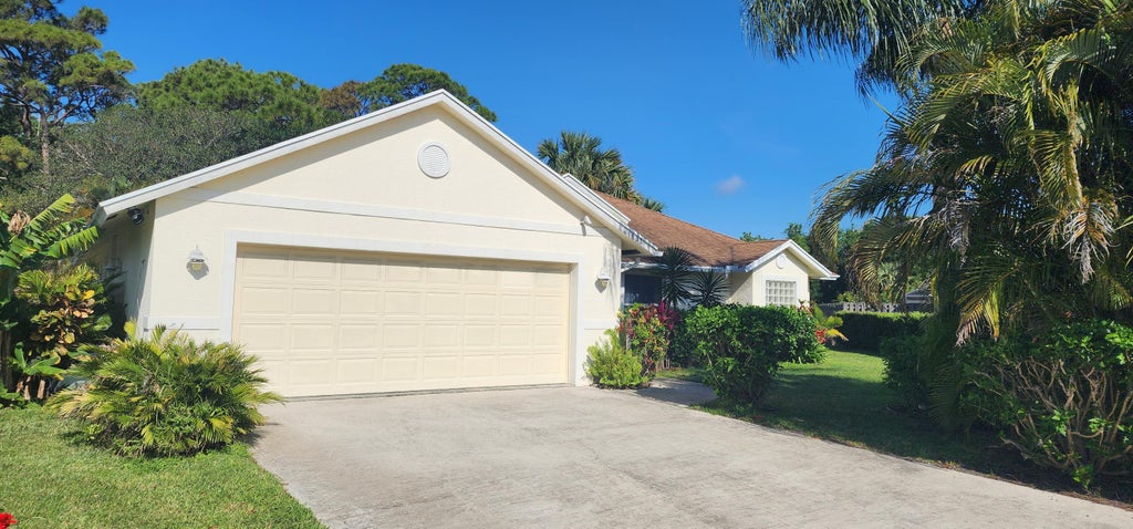 Photo of 602 N Weldwood Road N, Jupiter, FL 33458 (MLS # R11077356)