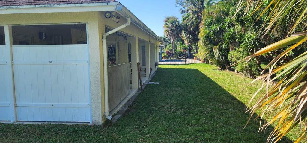 Photo of 602 N Weldwood Road N, Jupiter, FL 33458 (MLS # R11077356)