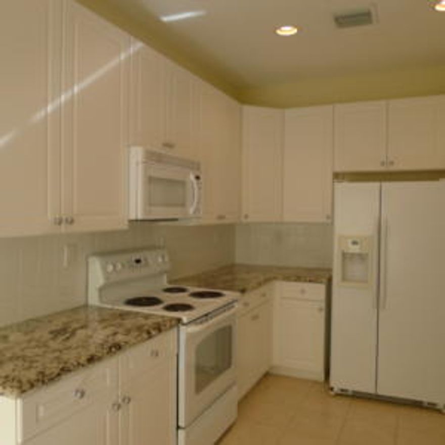 Great 3 bedroom 3 full baths corner unittownhouse in a gated community. One bedroom and full bath and walk-in closet on first floor. Master and 3rd bedroom plus bonus loft which can be used as an office on second floor. Washer and dryer on second floor. Neutral colors, granite countertops in kitchen, custom 42'' white cabinets. 9ft high ceilings, lots of natural light and extra windows make this home very bright. Hi-hat lighting, three fans,laminate floors on stairs and second floor bedrooms. Tiled floors on the first floor. Perfect home in a conveniently located community with a pool and playground ready to enjoy now.