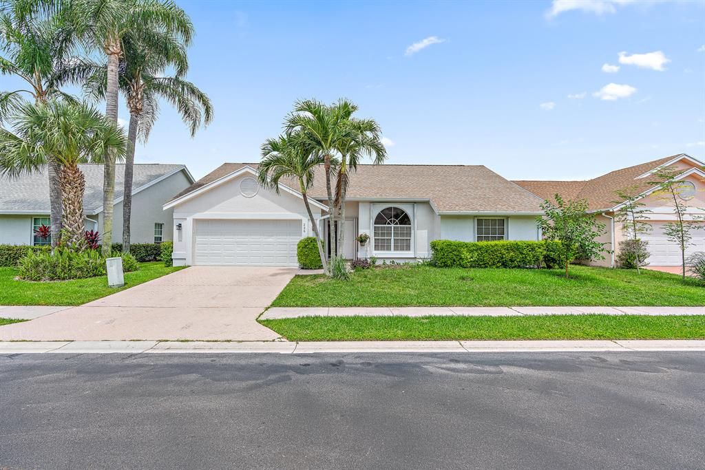 Photo of 236 Moccasin Trail Trl W, Jupiter, FL 33458 (MLS # R10811180)