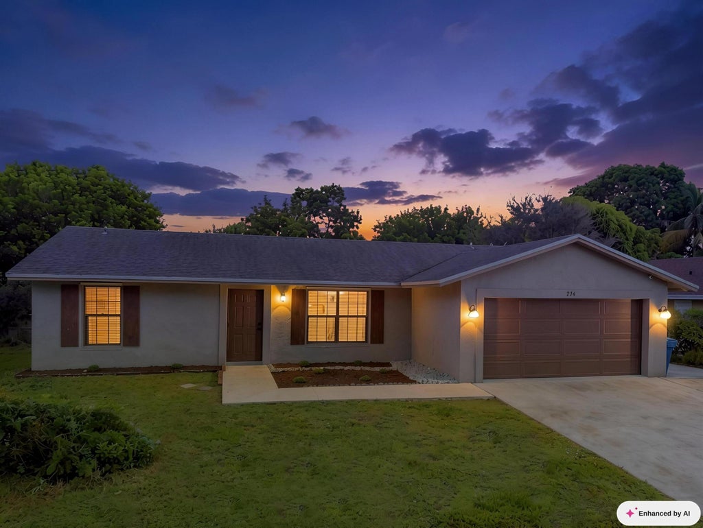 Photo of 234 La Mancha Avenue, Royal Palm Beach, FL 33411 (MLS # B26075708)