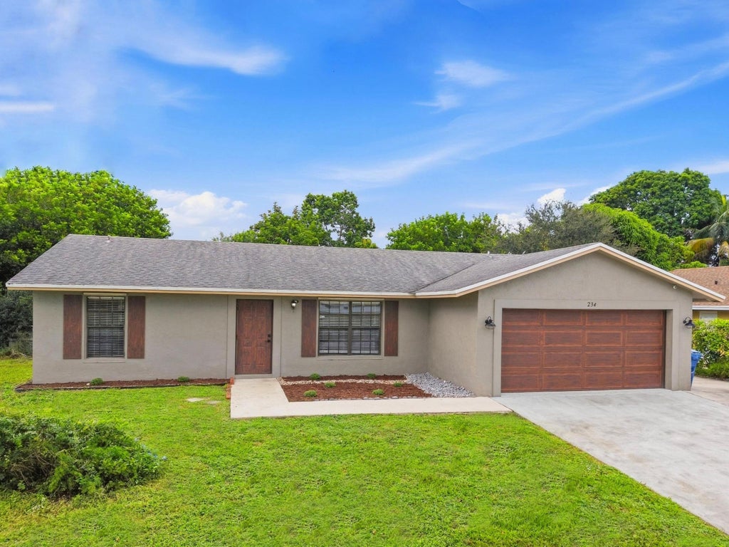 Photo of 234 La Mancha Avenue, Royal Palm Beach, FL 33411 (MLS # B26075708)