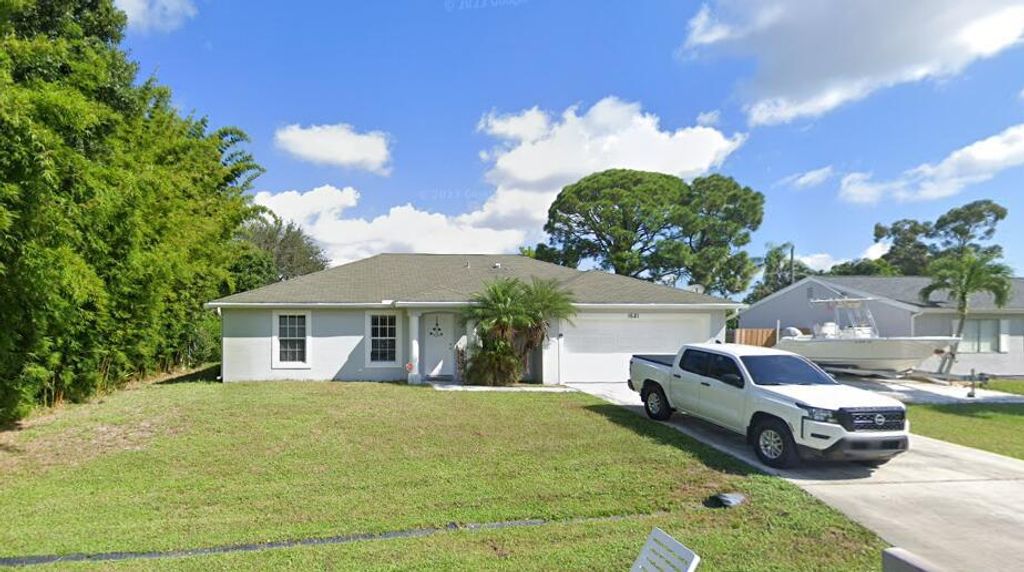 Photo of 1621 SE Minorca Avenue, Port Saint Lucie, FL 34952 (MLS # R10994393)