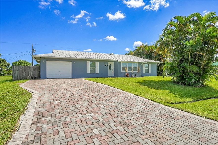 LAWNCARE INCLUDED!! Spacious home with a great layout. This home features 3 bedrooms, 2 bathrooms plus a bonus room for a 4th bedroom, playroom, office with tile flooring throughout, REAL fireplace, vaulted ceilings, sky lights which bring a ton of natural light, expansive galley kitchen with plenty of cabinets, granite counter tops, stainless steel appliances, NEW washer & dryer. HUGE backyard with deck. Long wide paved driveway that can hold plenty of vehicles or a boat.