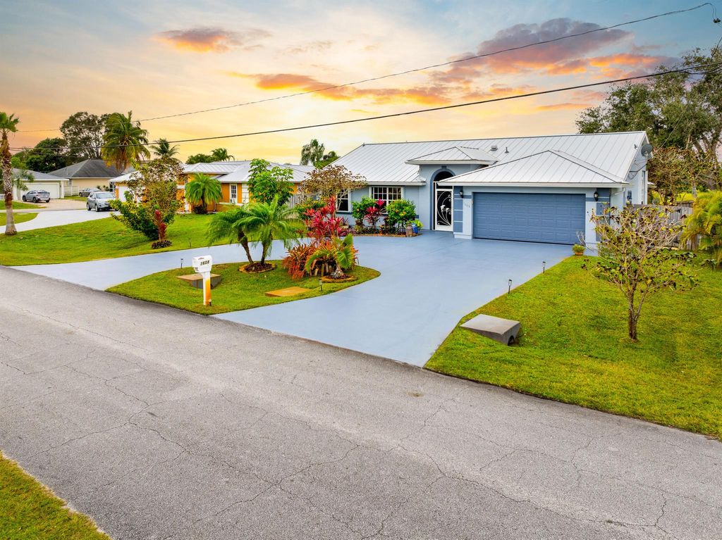 Photo of 1608 SE Durango Street, Port Saint Lucie, FL 34952 (MLS # R11053070)