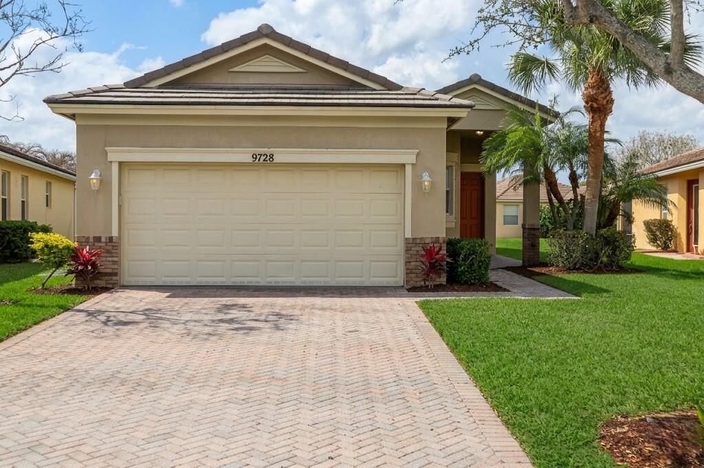 Photo of 9728 SW Eastbrook Circle, Port Saint Lucie, FL 34987 (MLS # B26004254)