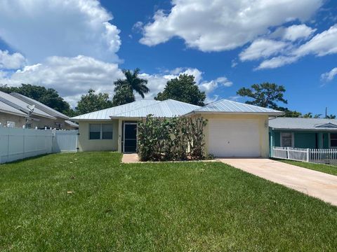 Property photo of 1057 sw spruce street, palm city, fl 34990
