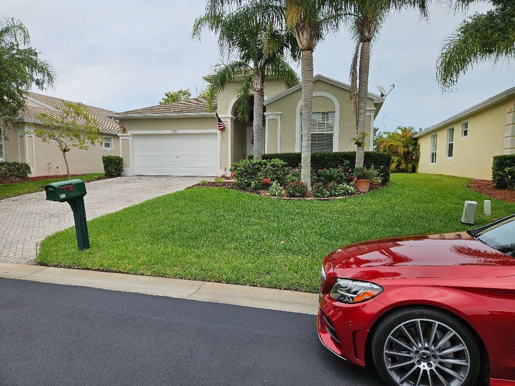 Photo of 552 SW Calamondin Way Way SW, Vero Beach, FL 32968 (MLS # B26036779)