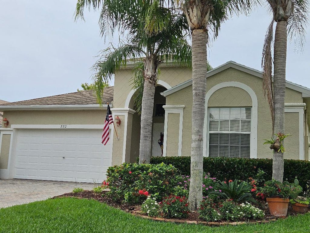 Photo of 552 SW Calamondin Way Way SW, Vero Beach, FL 32968 (MLS # B26036779)