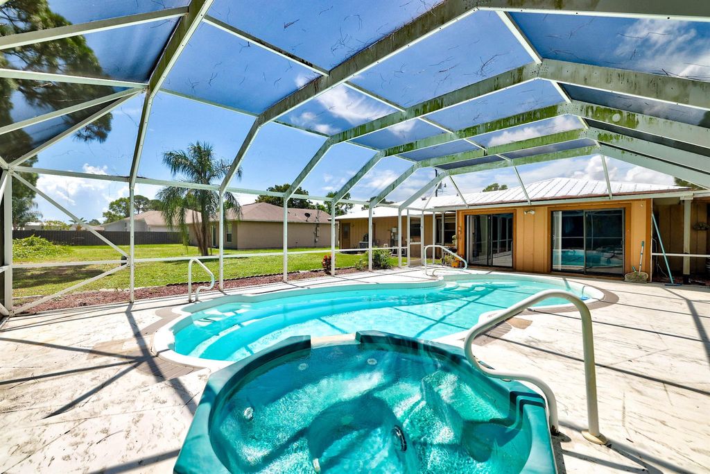 Photo of 2749 SE Mariposa Avenue, Port St Lucie, FL 34952 (MLS # R10905903)