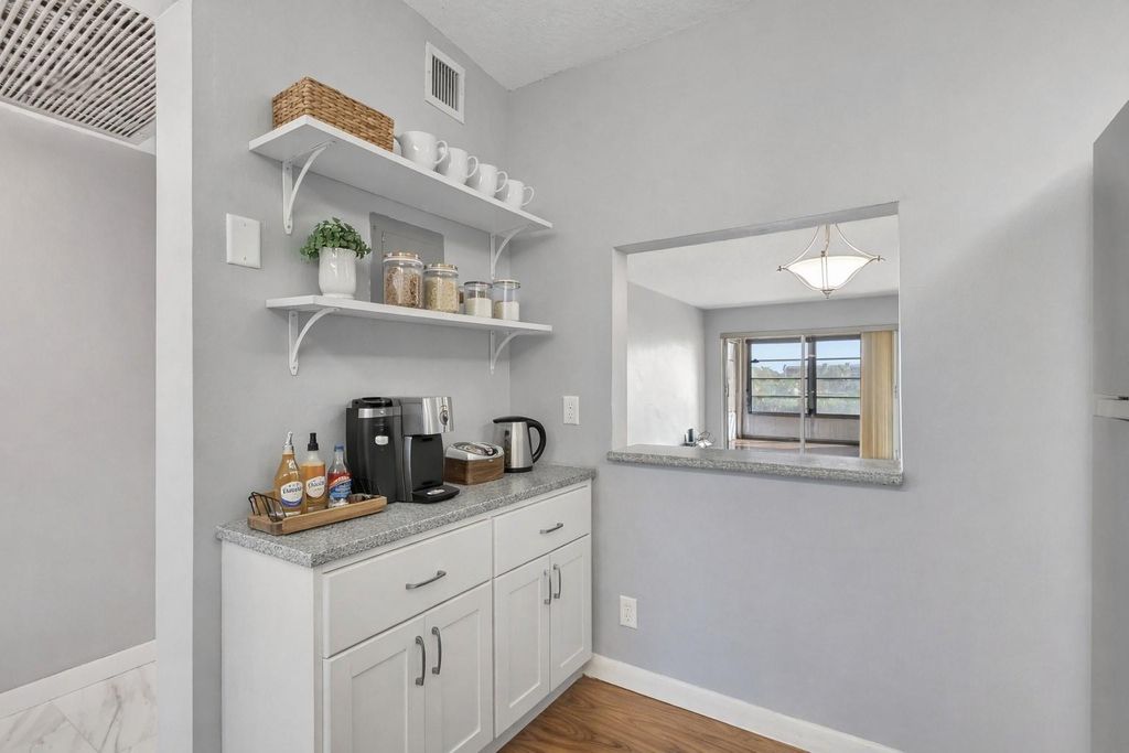 Photo of 9300 SW 8th Street #303, Boca Raton, FL 33428 (MLS # F10551724)