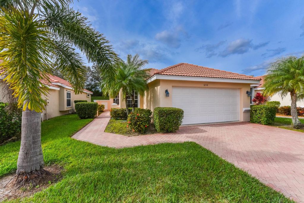 Photo of 650 SW Treasure Cove, Port St Lucie, FL 34986 (MLS # R10947057)