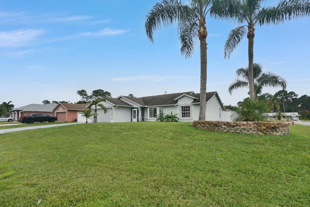 Photo of 1682 SW Duclair Avenue, Port Saint Lucie, FL 34953 (MLS # R10967137)