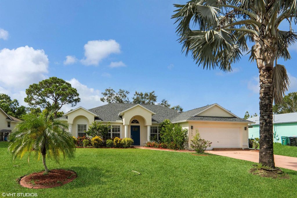 Photo of 562 NW Azine Avenue, Port St Lucie, FL 34983 (MLS # R10915927)