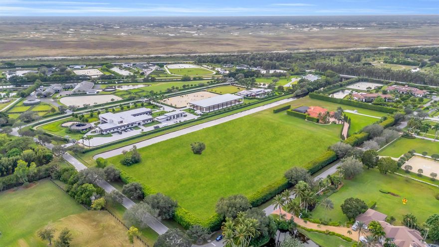 Build your Equestrian dream Estate in the exclusive gated community of Palm Beach Point just minutes from the show. Enjoy dual entry access from Palm Beach Point Blvd and Estancia Ln, offering convenient and private entrances for both the residence and barn.Hack your horse to the show and enjoy the most desired trails in all of Wellington. This 5.54 acre parcel is uniquely situated on a corner lot with plenty of room to build everything you want.