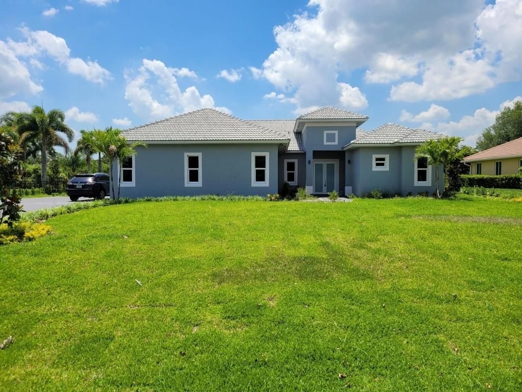 Photo of 1316 SW Squire Johns Lane, Palm City, FL 34990 (MLS # R10740432)