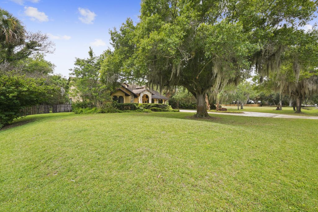 Photo of 197 Tumblin Kling Road, Fort Pierce, FL 34982 (MLS # B26016358)