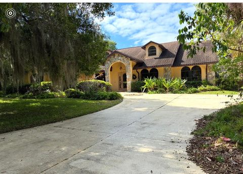 Photo of 197 Tumblin Kling Road, Fort Pierce, FL 34982 (MLS # B26016358)