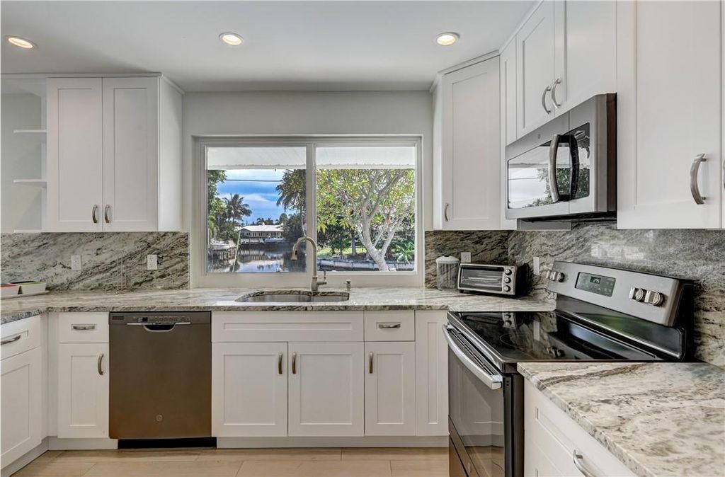 Photo of 840 SW 7th Street, Boca Raton, FL 33486 (MLS # F10412169)