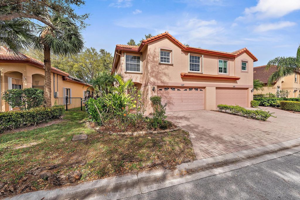Photo of 1147 Via Jardin, Riviera Beach, FL 33418 (MLS # R11068191)