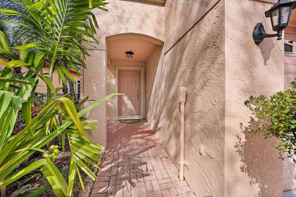 Photo of 1147 Via Jardin, Riviera Beach, FL 33418 (MLS # R11068191)