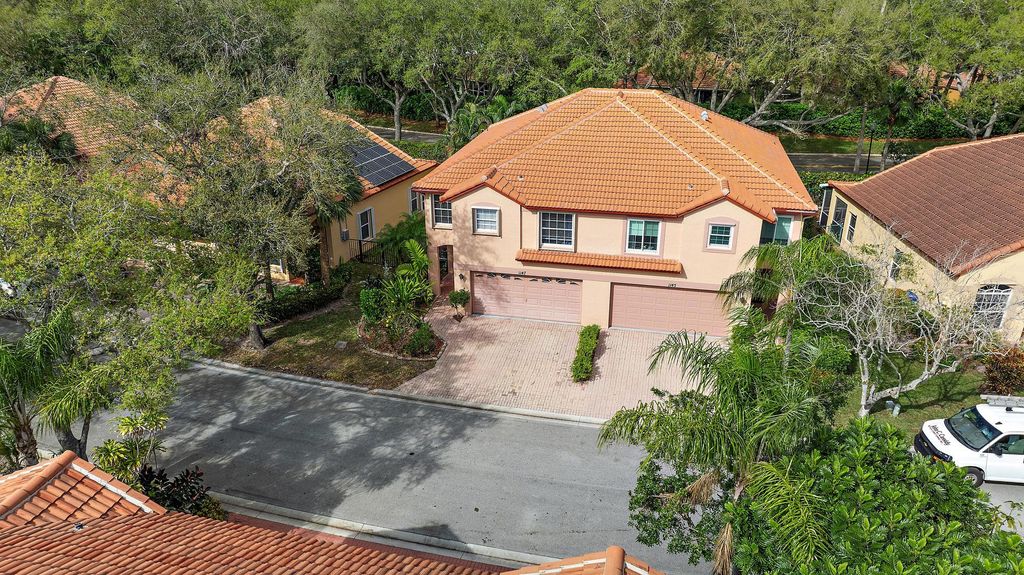 Photo of 1147 Via Jardin, Riviera Beach, FL 33418 (MLS # R11068191)