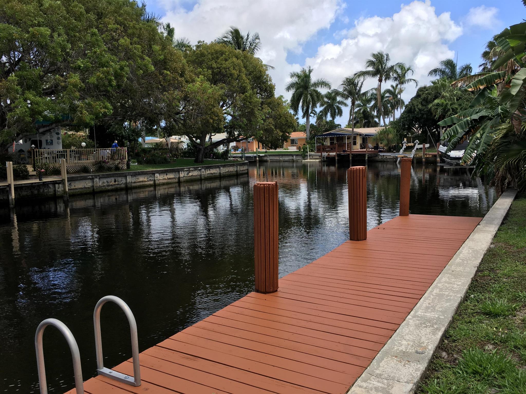Large 1 bedroom and 1 bath in Coral Ridge Isles. Updated laminated wood flooring throughout. Large kitchen with glass-top stove, dishwasher and refrigerator. Open Dining/Living Room area. Walk-in closet and lots of closet space. Updated bathroom. Freshly painted, cleaned and ready. Very quiet and private street. Beautiful water views of the canal. Central AC. Rent inc. Water/Sewer and Garbage removal. On site Laundry facility. Quick approval.