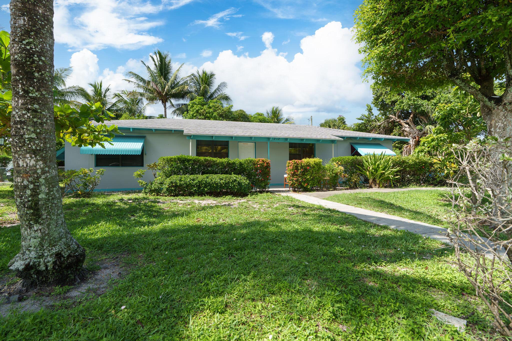 Here's an incredible 4-bed/2-bath home w/an attached in-law studio, totaling nearly 1,700 sq ft under air on a vast 11,000 sq ft corner lot in highly desirable Delray Beach. Just a short drive from Atlantic Ave's vibrant dining, shopping, & entertainment, it's only10 minutes from award-winning beaches. The expansive backyard is a blank canvas for your vision-add a pool, outdoor dining, or a cozy lanai. Perfect for investors seeking high rental potential in a hot market or those desiring a seasonal escape or year-round residence. A little TLC will customize this home to your preferences & capitalize on your return as this area is experiencing a luxury facelift. No HOA/Rental Restrictions. This property offers unmatched potential in a prime location. Sold As Is. Don't miss this opportunity!