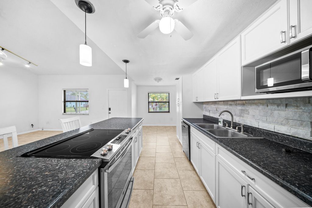 Photo of 5502 Hickory Drive, Fort Pierce, FL 34982 (MLS # R11097450)