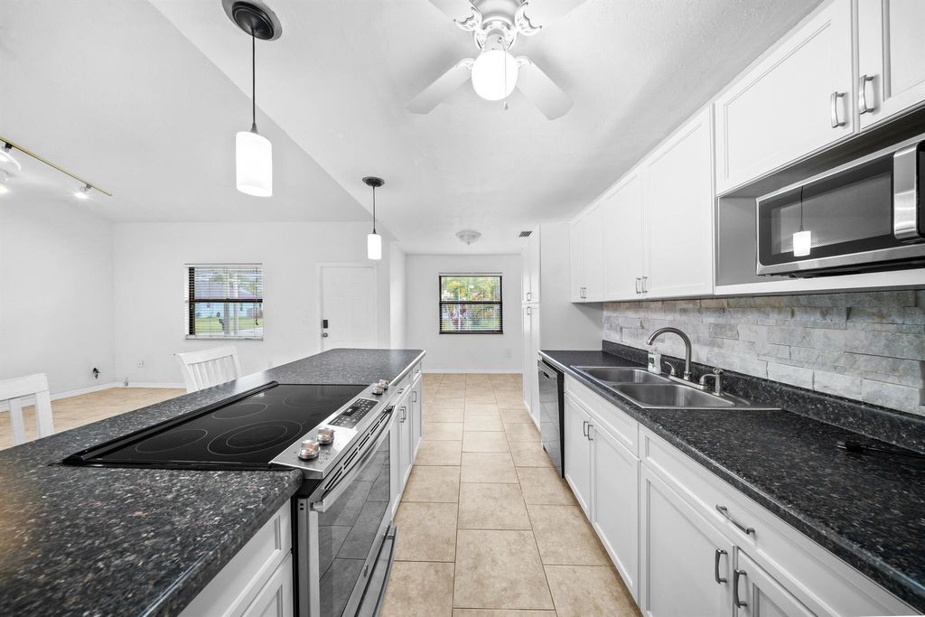 Photo of 5502 Hickory Drive, Fort Pierce, FL 34982 (MLS # R11097450)