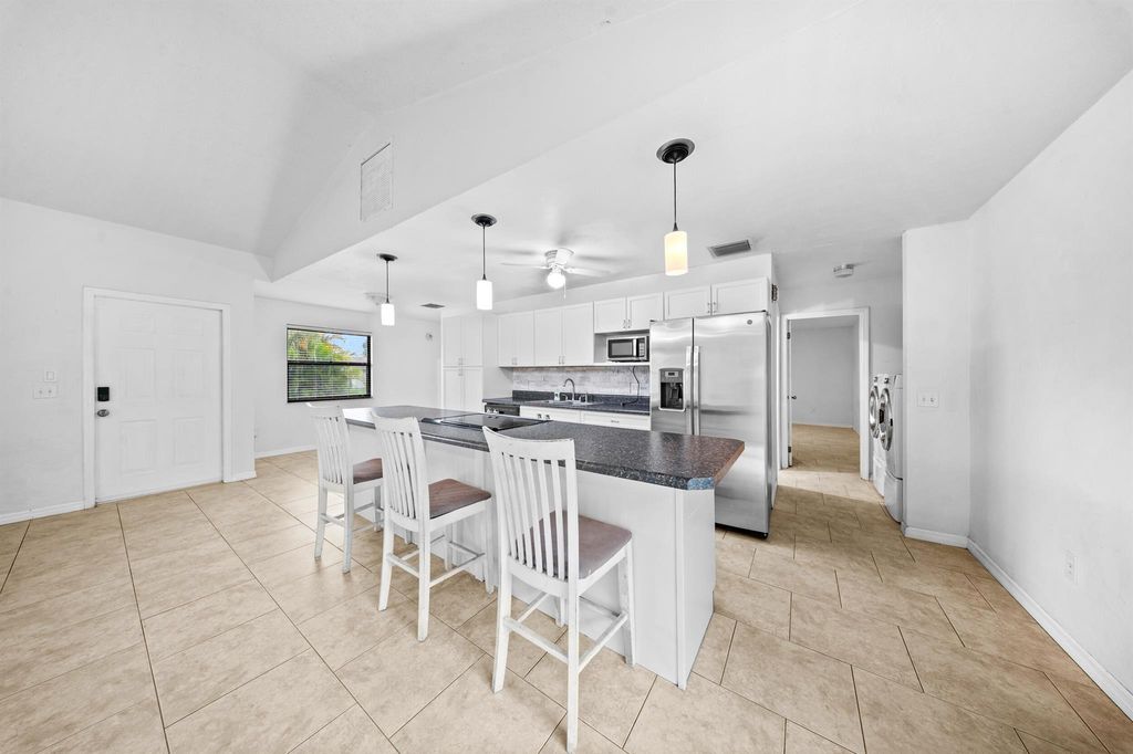 Photo of 5502 Hickory Drive, Fort Pierce, FL 34982 (MLS # R11097450)