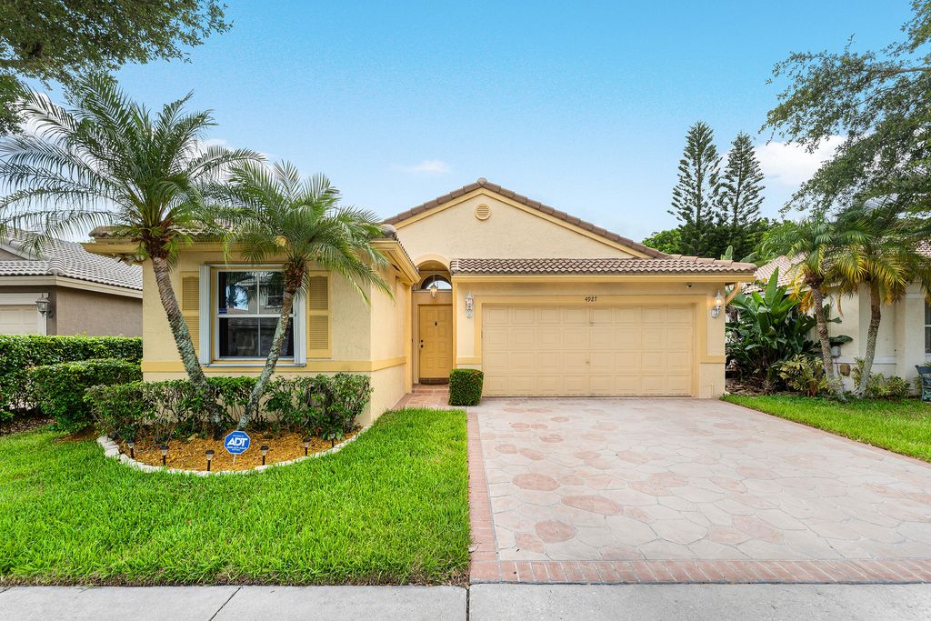 Photo of 4927 NW 55th Boulevard, Coconut Creek, FL 33073 (MLS # B26030804)