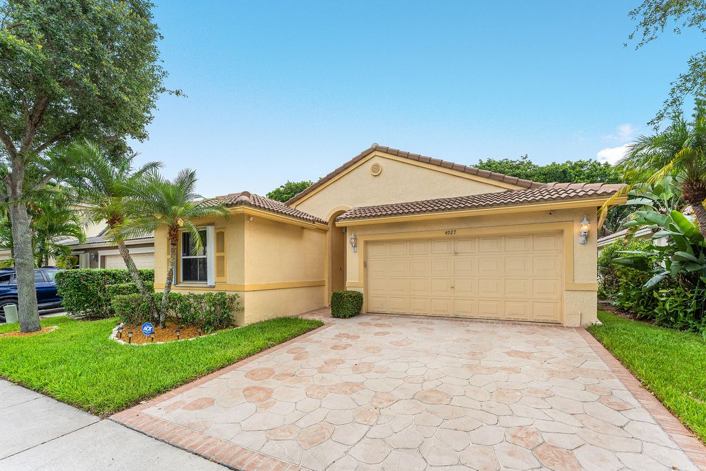 Photo of 4927 NW 55th Boulevard, Coconut Creek, FL 33073 (MLS # B26030804)
