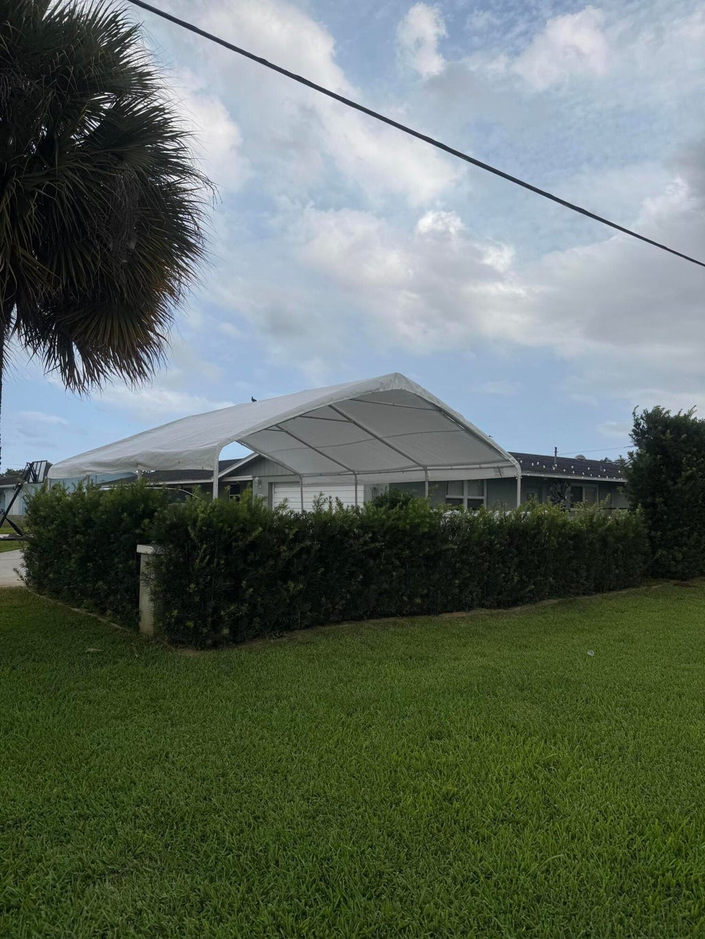 Photo of 3120 Emerald Lane, Lake Worth, FL 33462 (MLS # B26036554)