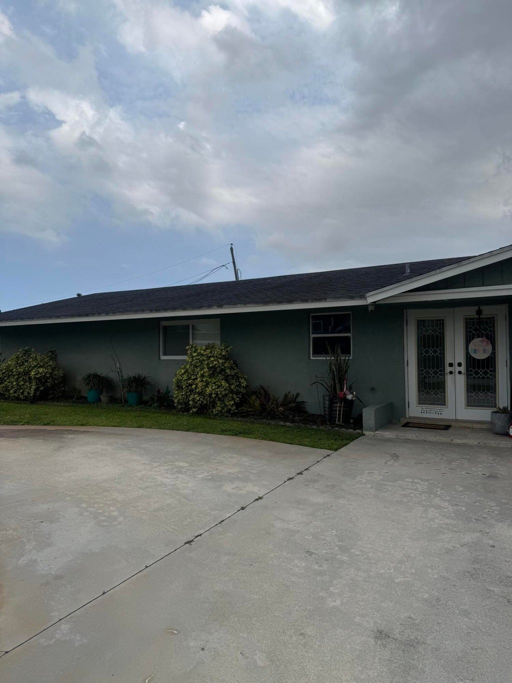 Photo of 3120 Emerald Lane, Lake Worth, FL 33462 (MLS # B26036554)