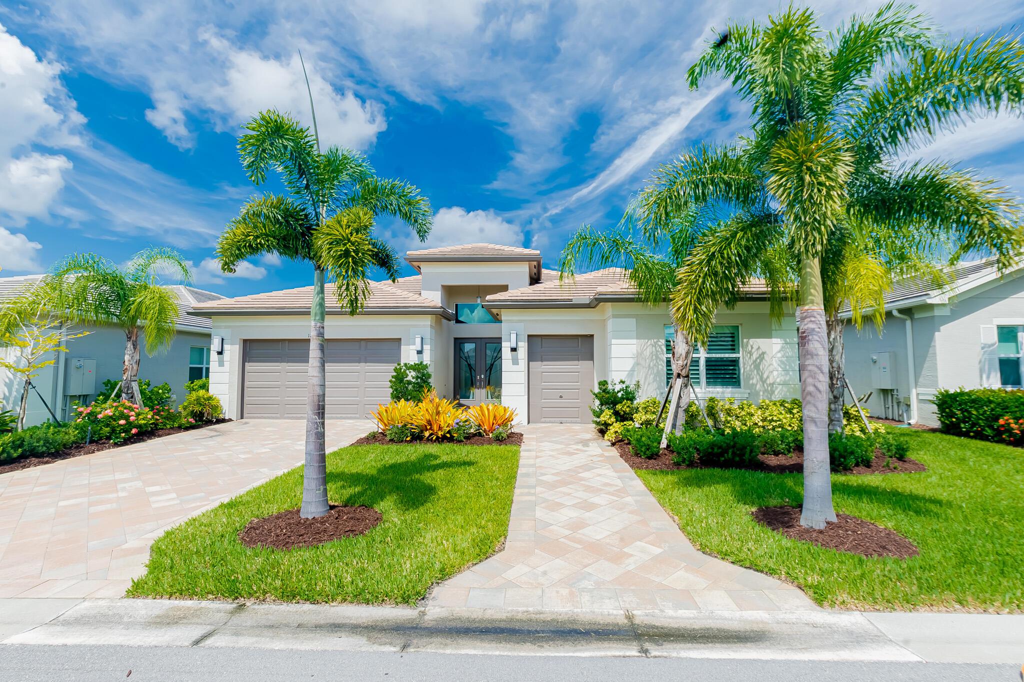 Riverland, Valencia Grove! Live the luxe lifestyle in this stunning Bianca Model featuring 2 bedrooms plus a den & flex room, 3 bathrooms, 2-car garage + dedicated golf cart garage - complete with pool on an oversized lot! High-end finishes shine throughout: plantation shutters, designer fixtures, and elegant tile floors. The gourmet kitchen impresses with quartz counters, vented gas cooktop, wall oven/microwave, touchscreen 4-door fridge, cook island, soft-close cabinets, and huge pantry. Enjoy a built-in speaker system inside and out, 2-zone A/C, and a private fenced yard perfect for entertaining on the spacious lanai. Split bedrooms offer comfort and privacy. Resort-style living awaits--clubhouse, fitness, arts, pickleball, pools & more in this vibrant 55+ community!